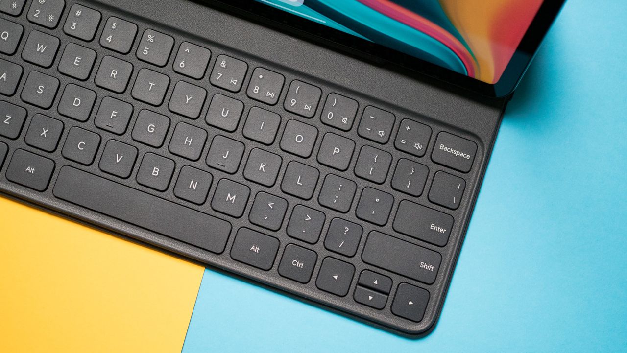 Redmi Pad Pro's keyboard case docked to the tablet
