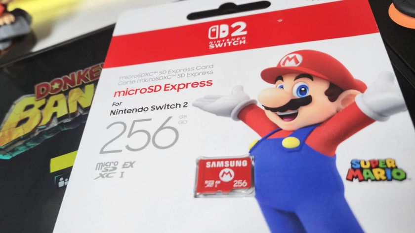 Photo by Rosalie Newcombe of the Samsung 256GB microSD Express Card in its Mario packaging sitting on a Switch 2.