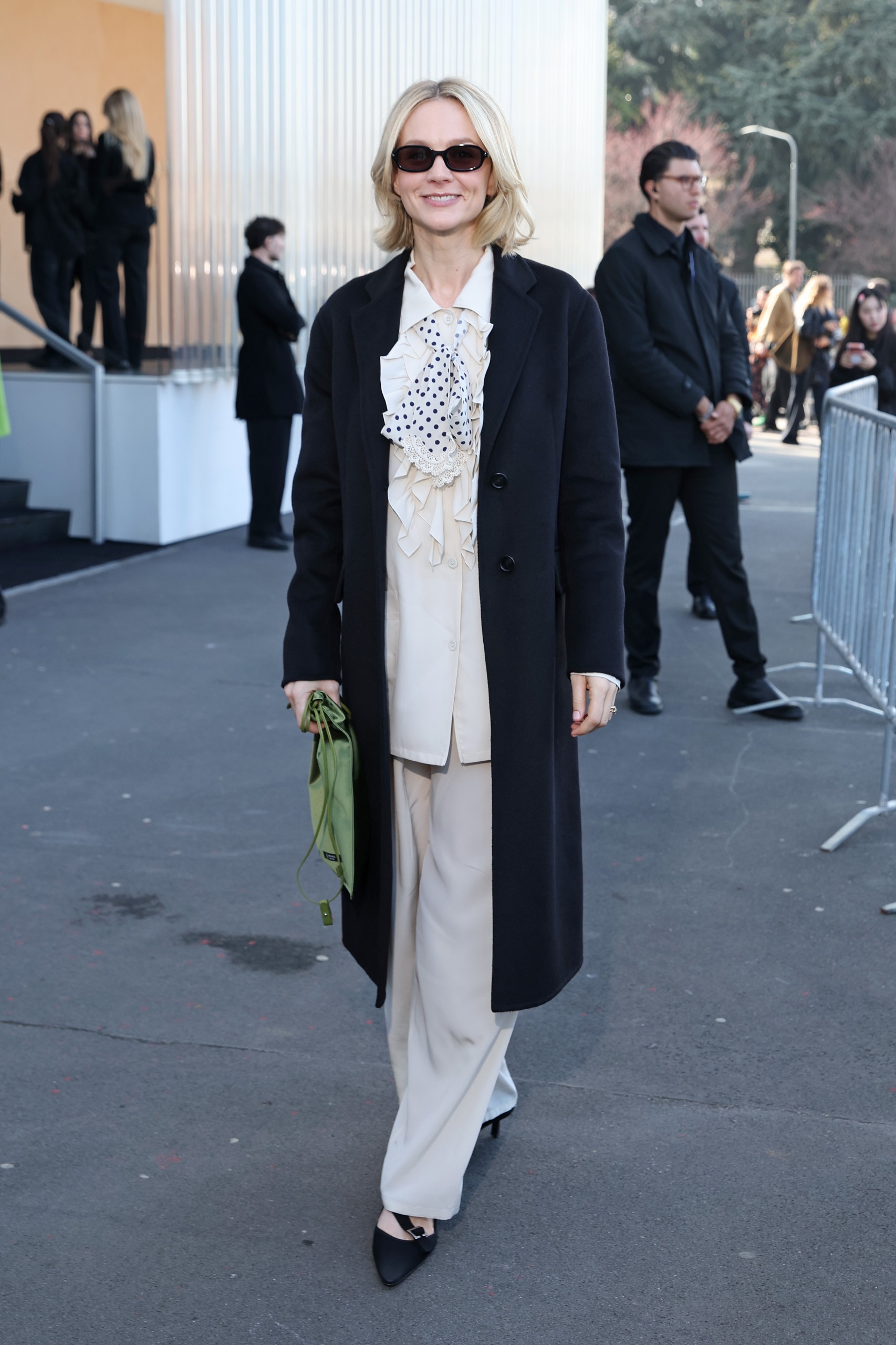 Carey Mulligan carried the Prada Wish Silk Duchesse Pouch before it became the Lyst Index's &amp;quot;hottest&amp;quot; product