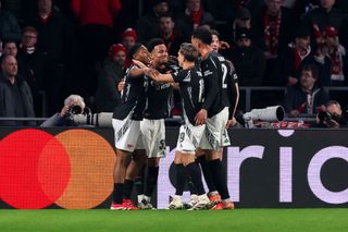 EINDHOVEN, NETHERLANDS - MARCH 4: Ethan Nwaneri of Arsenal FC celebrates after scoring his teams second goal, Myles Lewis-Skelly of Arsenal FC, Declan Rice of Arsenal FC during the UEFA Champions League 2024/25 Round of 16 First Leg match between PSV and Arsenal FC at PSV Stadion on March 4, 2025 in Eindhoven, Netherlands. (Photo by Ben Gal/BSR Agency\Getty Images)