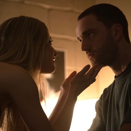 a young woman touches a man's chin as they lean in for a kiss in tell me lies season 3