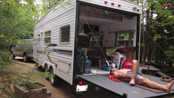 This RV includes a yoga studio.