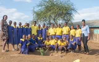 Kenyan teachers and children with Sanjayan