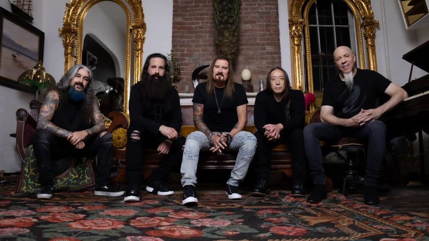 Dream Theater sat on a couch