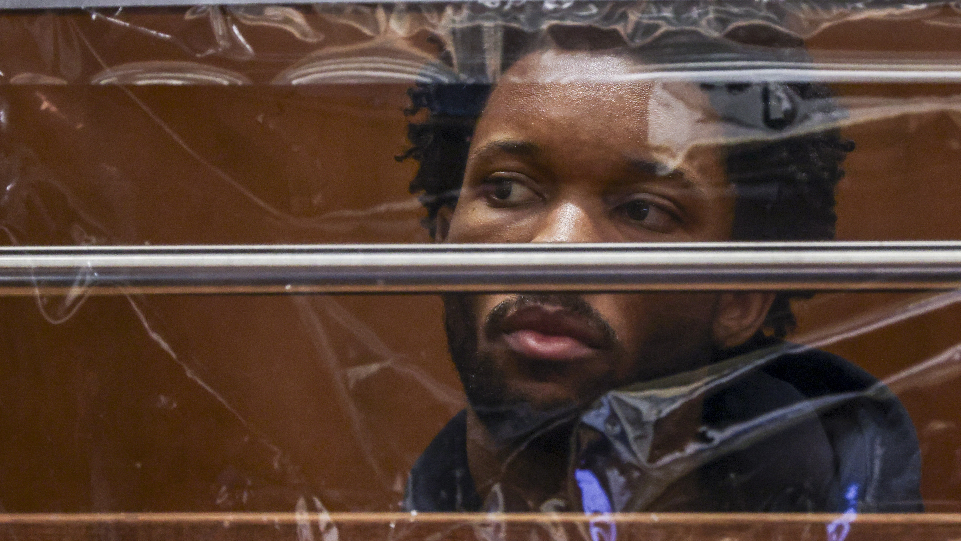 LOS ANGELES, CALIFORNIA - APRIL 20: d4vd looks on during his arraignment for the murder of Celeste Rivas Hernandez at Clara Shortridge Foltz Criminal Justice Center on April 20, 2026 in Los Angeles, California. Nathan J. Hochman, Los Angeles County District Attorney, announced earlier in the day that David Anthony Burke, known as d4vd, was charged with the first-degree murder of 14-year-old Celeste Rivas Hernandez, whose body was found decomposed in his car. (Photo by Ted Soqui - Pool/Getty Images)