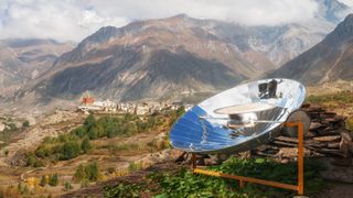 Solar cooker in Nepal Himalayan landscape