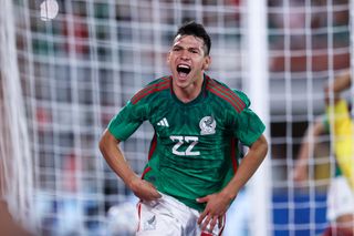 Hirving Lozano #22 of Mexico celebrates after scoring his team's first goal during the friendly match between Mexico and Peru at Rose Bowl on September 24, 2022 in Pasadena, California.