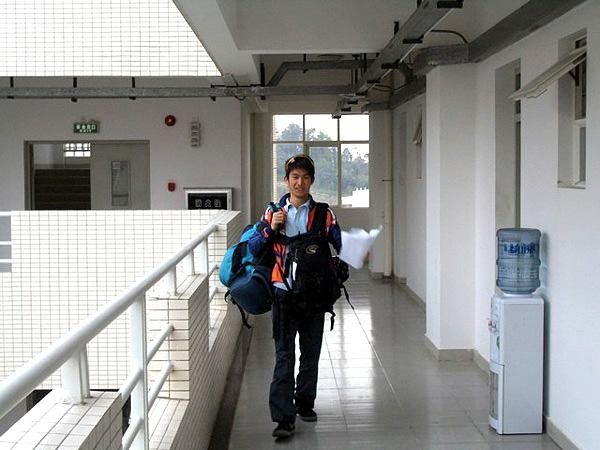 Simon Chau gets ready to descend from seven stories up.