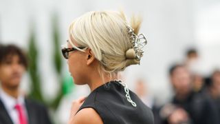 woman wearing a silver claw clip