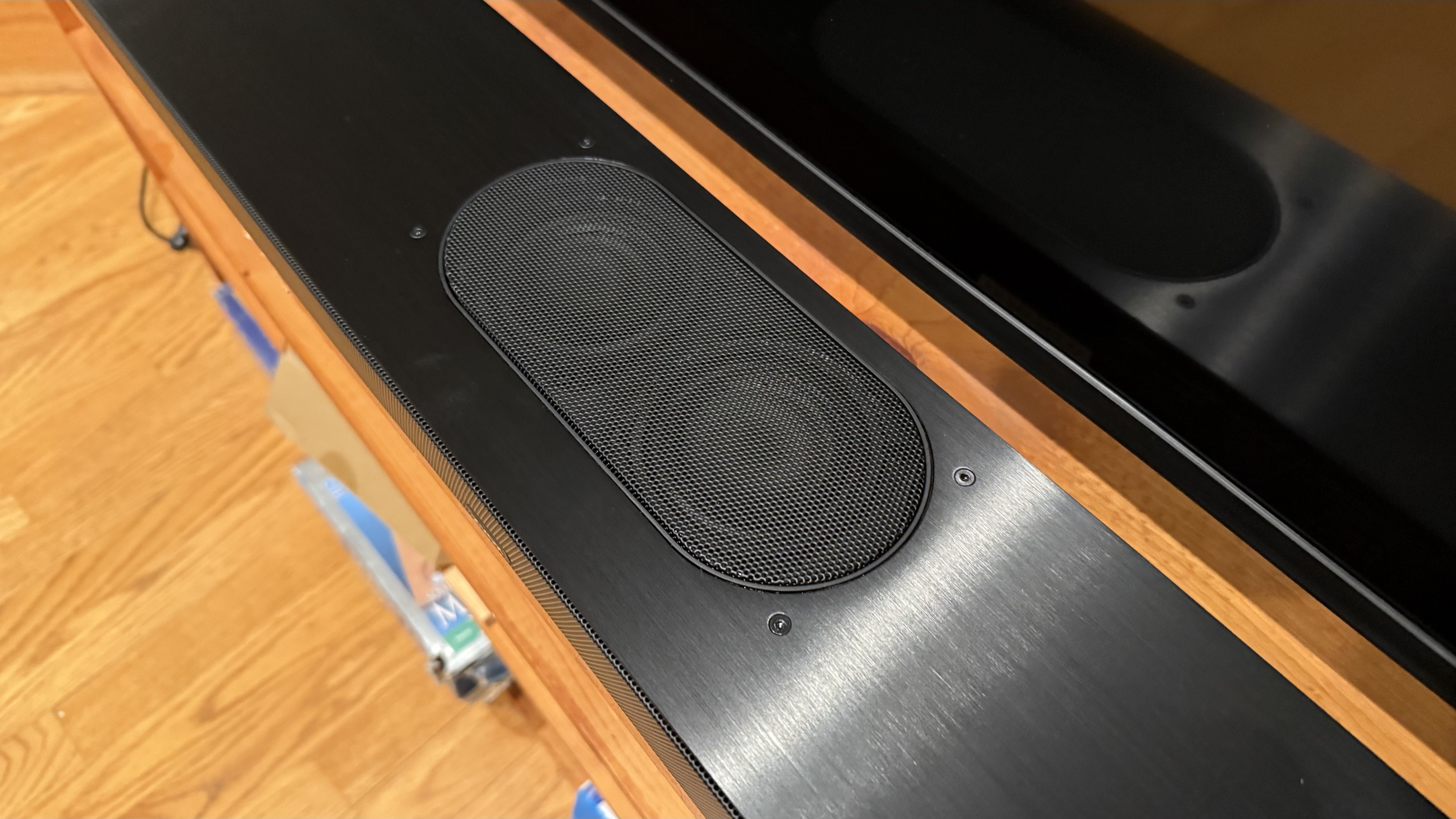 A closeup shot of the Zvox AccuVoice AV855 soundbar and its upward firing speakers