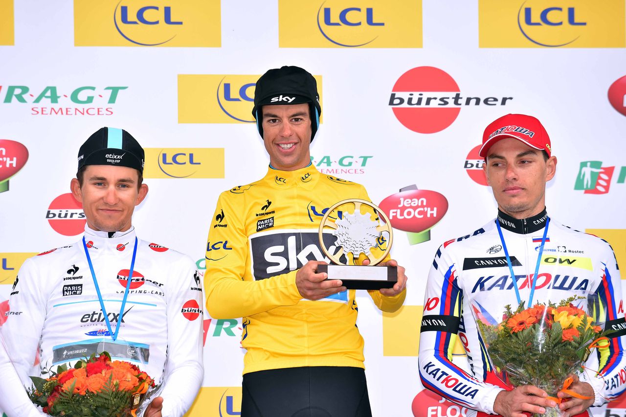 Richie Porte takes his winner's trophy