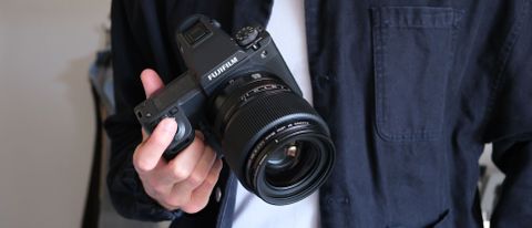 Fujifilm GFX 100 II camera close up in a hand