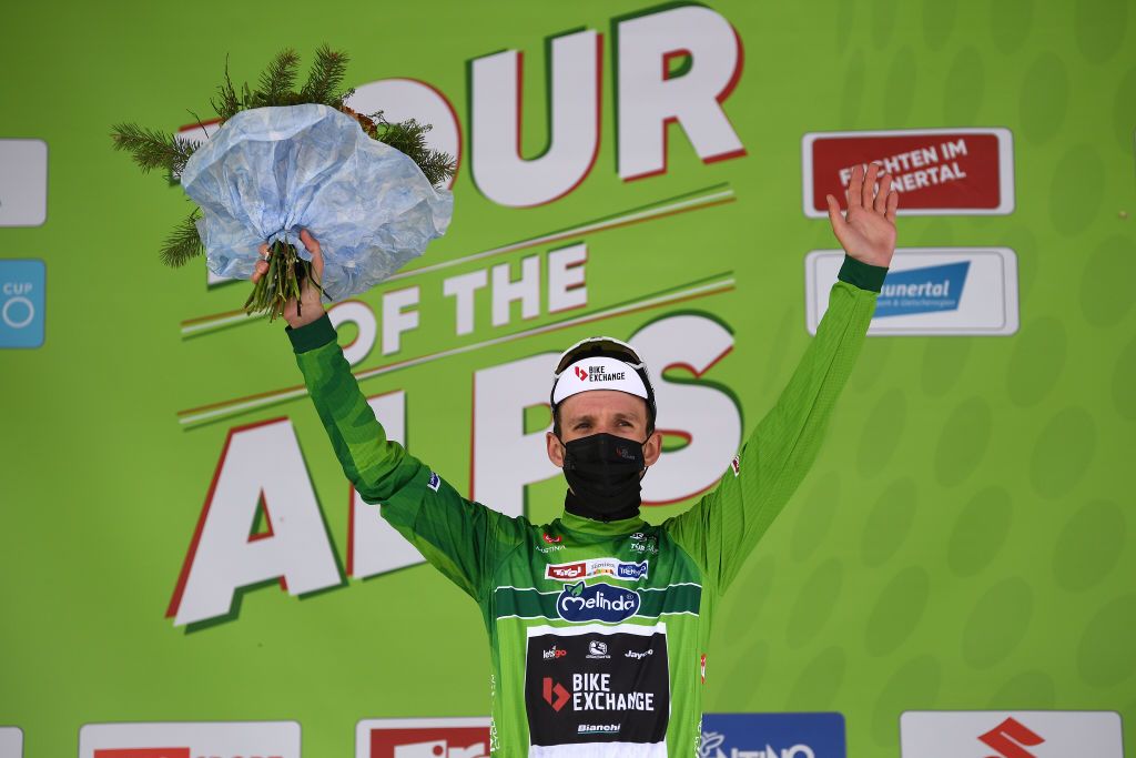 FEICHTEN IM KAUNERTAL AUSTRIA APRIL 20 Simon Yates of United Kingdom and Team BikeExchange Green Leader Jersey celebrates at podium during the 44th Tour of the Alps 2021 Stage 2 a 1215km stage from Innsbruck to Feichten im Kaunertal 1291m Mask Covid Safety Measures TourofTheAlps TouroftheAlps on April 20 2021 in Feichten im Kaunertal Austria Photo by Tim de WaeleGetty Images
