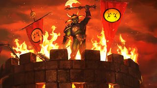 A Warcraft orc standing atop a castle in flames with an axe raised over his head