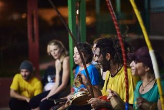 People, Social group, Community, Idiophone, Midnight, Hand drum, Rope, Percussionist, Membranophone,