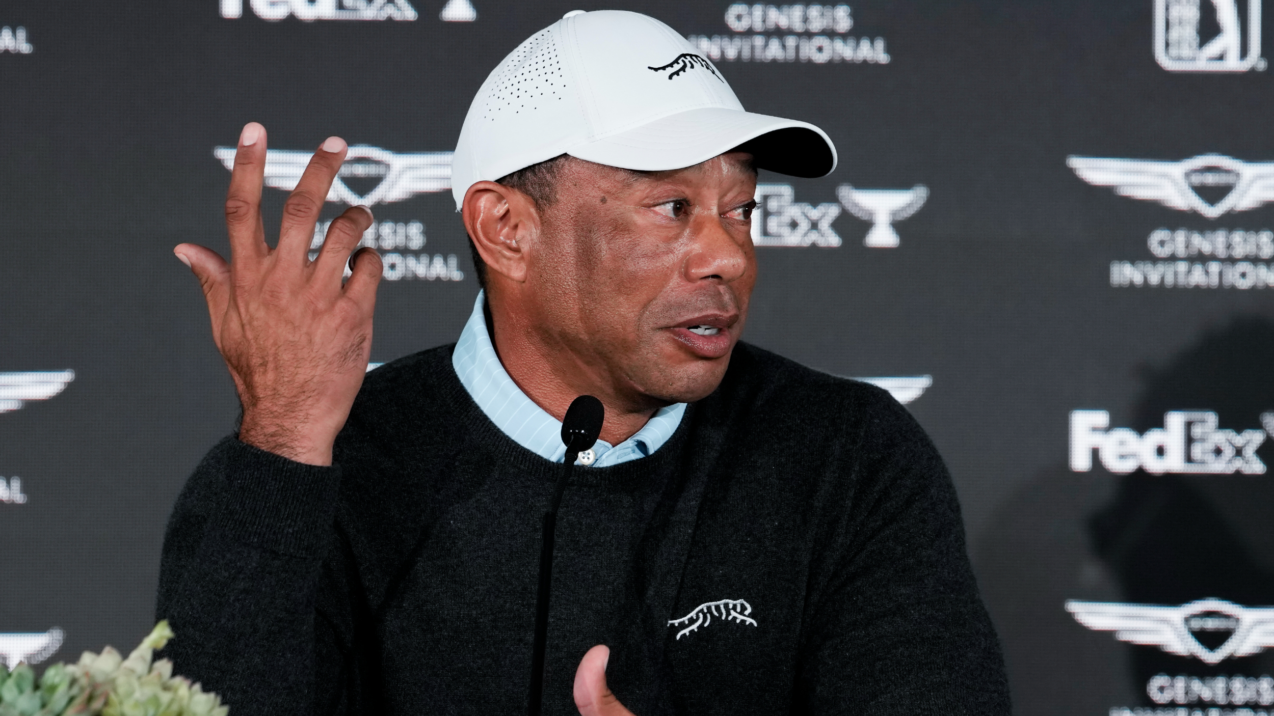 Tiger Woods talks to the media prior to the Genesis Invitational