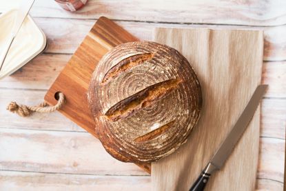 sourdough bread on wooden cutting board