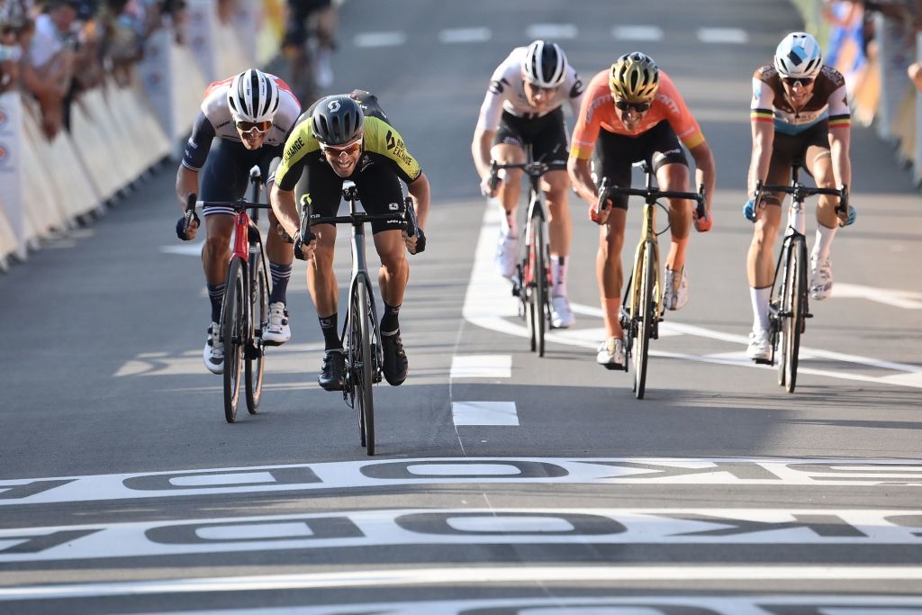 Team Mitchelton rider Slovenias Luka Mezgec 2ndL sprints to cross the finish line at the second place at the end of the 19th stage of the 107th edition of the Tour de France cycling race 160 km between BourgenBresse and Champagnole on September 18 2020 Photo by Marco BERTORELLO AFP Photo by MARCO BERTORELLOAFP via Getty Images