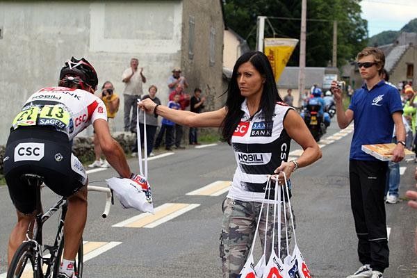 Swiss rider Fabian Cancellara (Team CSC - Saxo Bank) picks up some food after working hard in the front group.