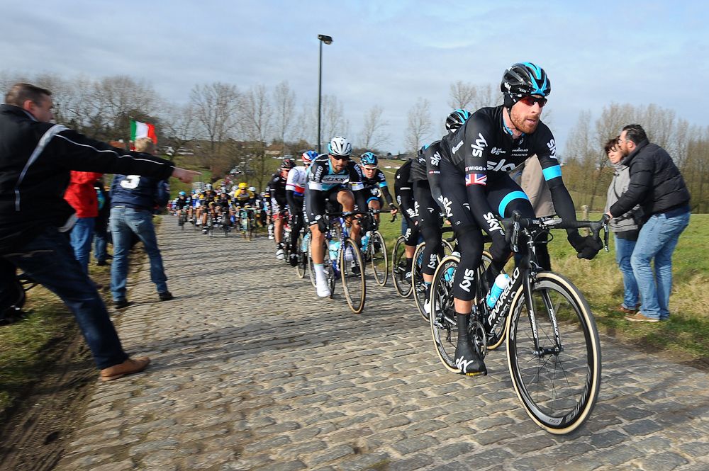 Bradley Wiggins pushes the pace on the cobbles.