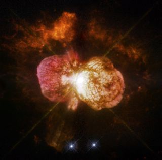 Eta Carinae's great eruption in the 1840's created the billowing Homunculus Nebula, imaged here by the Hubble Space Telescope. The expanding cloud contains enough material to make at least 10 copies of our sun. Astronomers don’t yet know what caused the eruption, but new research is moving scientists closer to understanding this complex system.