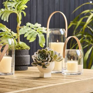 Small wood and glass outdoor lanterns from West Elm