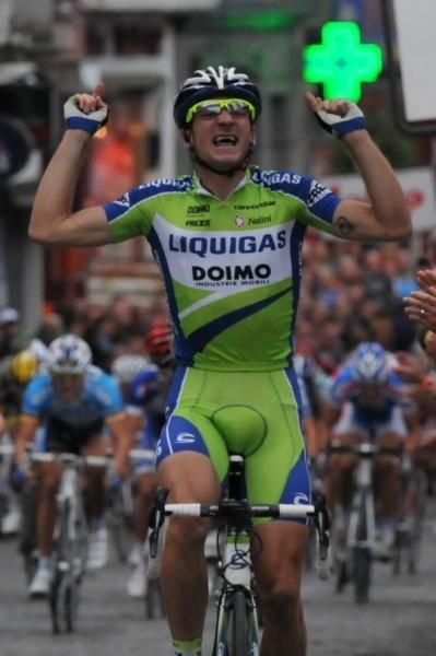 Elia Viviani (Liquigas-Doimo) pumps his arms in triumph.