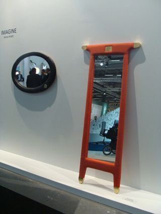 'Imagine' floor mirrors against a white background