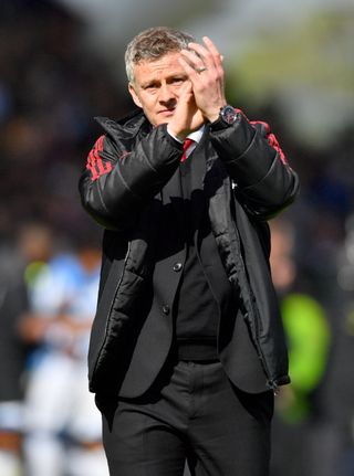 Manchester United manager Ole Gunnar Solskjaer applauds the fans after a disappointing draw