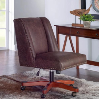 A brown leather desk chair with a square back