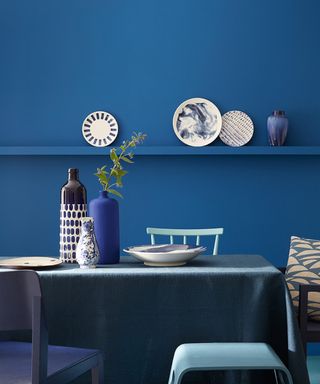 Wall, Mazarine Absolute Matt Emulsion £48.50 for 2.5L, Floor: Marine Blue, Intelligent Floor Paint £74 for 2.5L, Curved stool: Air Force Blue Intelligent Satinwood £75.50 for 2.5L Vase, Ultra Blue, special edition paint £51.50 for 2.5L by Little Greene