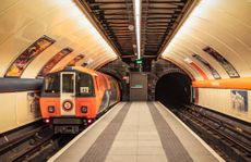 Glasgow Subway train arriving in a station