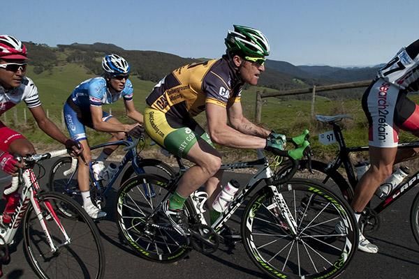 Tour leader Gordon McCauley (Hyster-Total Rush) finds his rhythm on the climb at Gunns Plains.
