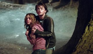 Harry Potter and the Prisoner of Azkaban Harry holding Hermione back in the forest