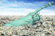 Statue of Liberty lying on US dollar bills