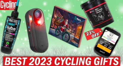 The Tredz Christmas gift guide has images of chain lube, a rear bike light, an advent calendar, a bike cleaning kit bucket, and a Garmin all on a green background 