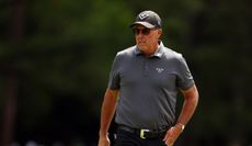 Phil Mickelson moves onto the green