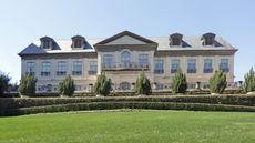 grand mansion house exterior with front lawn