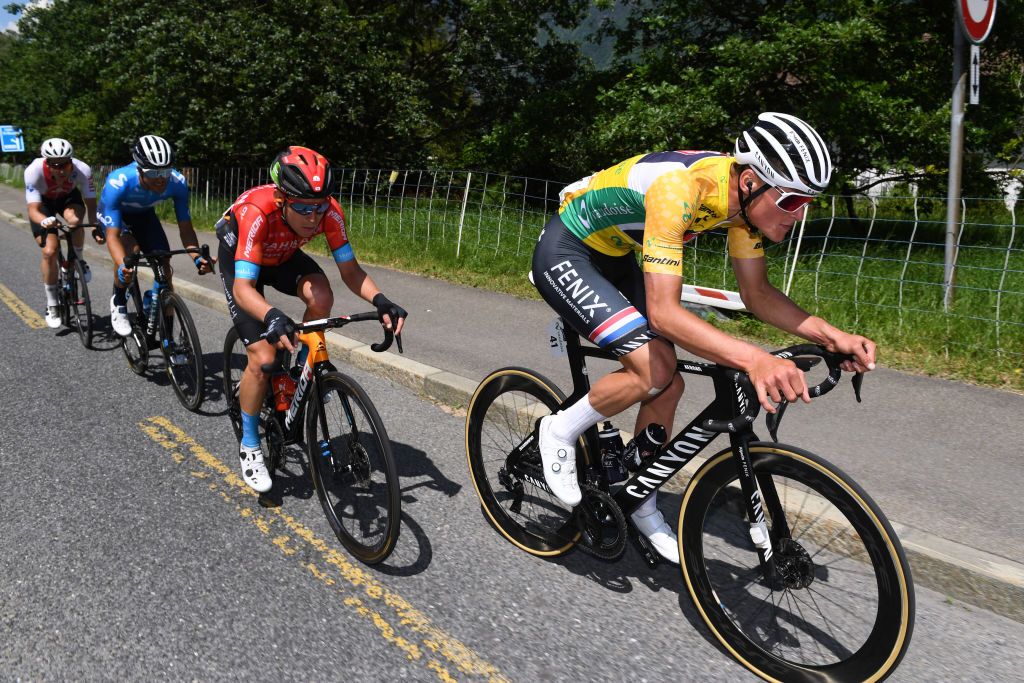 LEUKERBAD SWITZERLAND JUNE 10 Claudio Imhof of Switzerland and Team Switzerland Sergio Samitier Samitier of Spain and Movistar Team Hermann Pernsteiner of Austria and Team Bahrain Victorious Mathieu Van Der Poel of Netherlands and Team AlpecinFenix Yellow Leader Jersey in the Breakaway during the 84th Tour de Suisse 2021 Stage 5 a 1752km stage from Gstaad to Leukerbad 1385m UCIworldtour tds tourdesuisse on June 10 2021 in Leukerbad Switzerland Photo by Tim de WaeleGetty Images