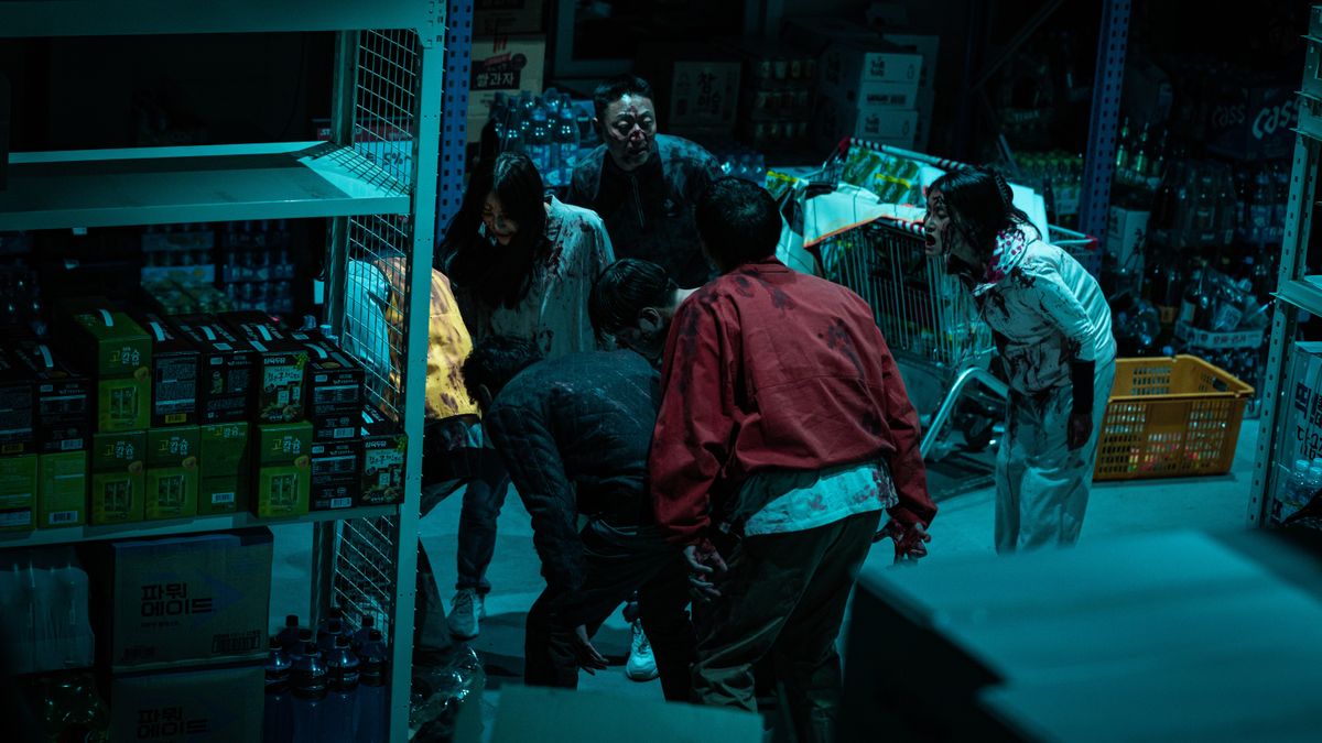 Zombies wander round a supermarket in Zombieverse