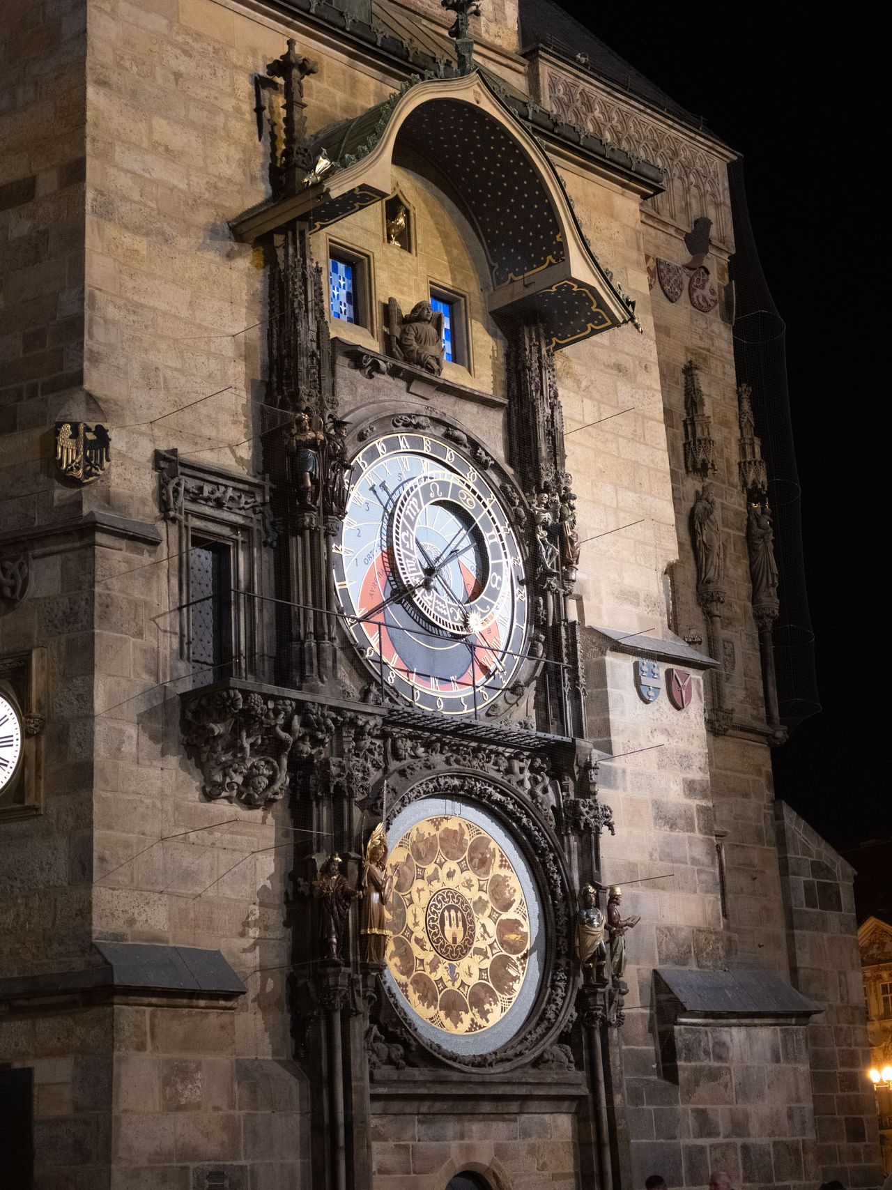 Famous clock tower in Prague lit up at night