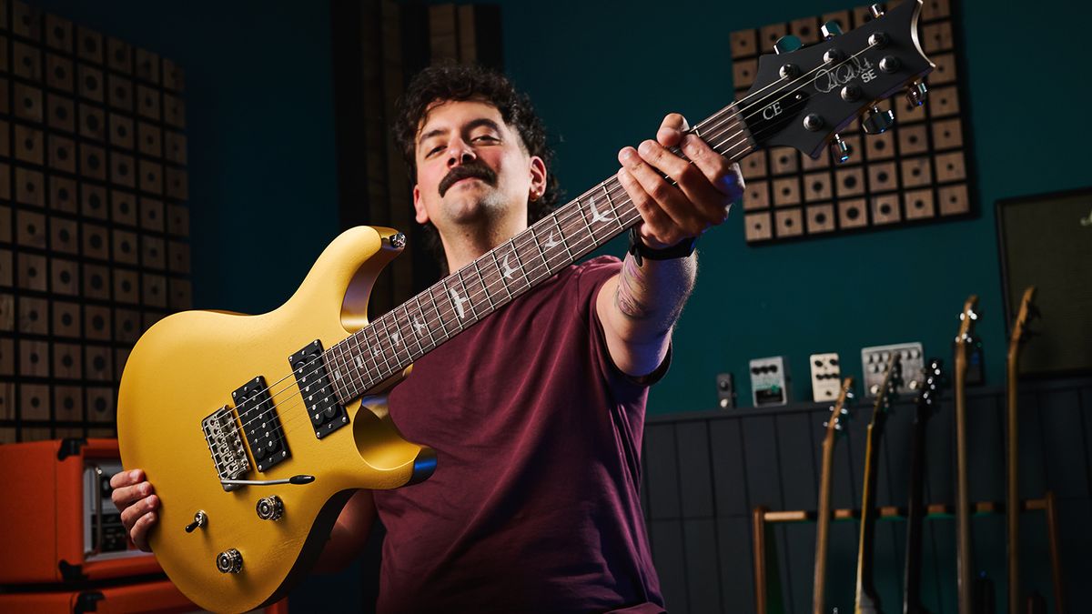 Matt holding the PRS SE Standard
