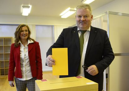 Iceland's Prime Minister Sigurdur Ingi Johannsson votes in the election that led to his resignation