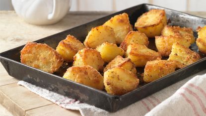 Gordon Ramsay's roast potatoes on an oven tray