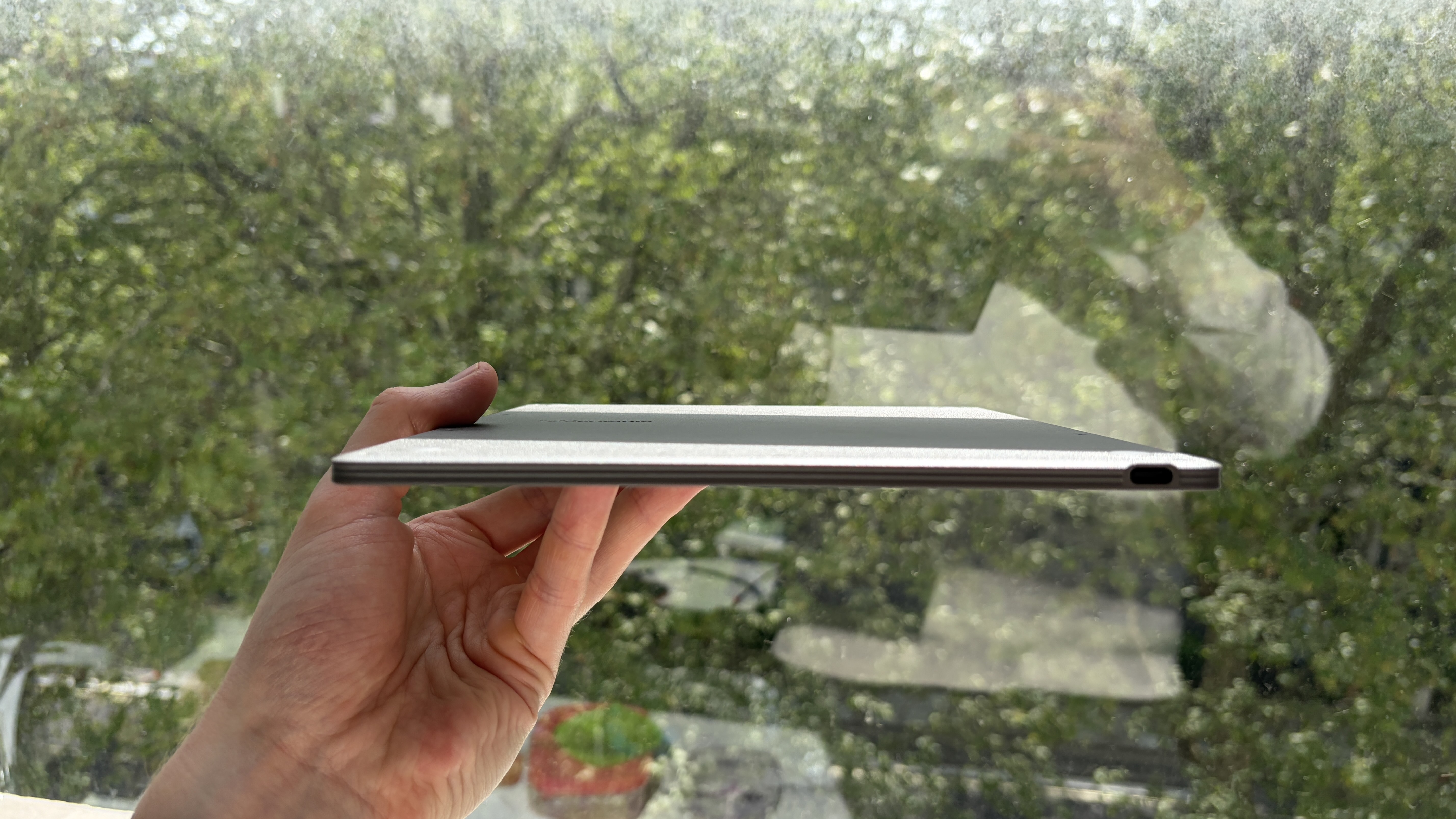 The reMarkable Paper Pure being held in the hand