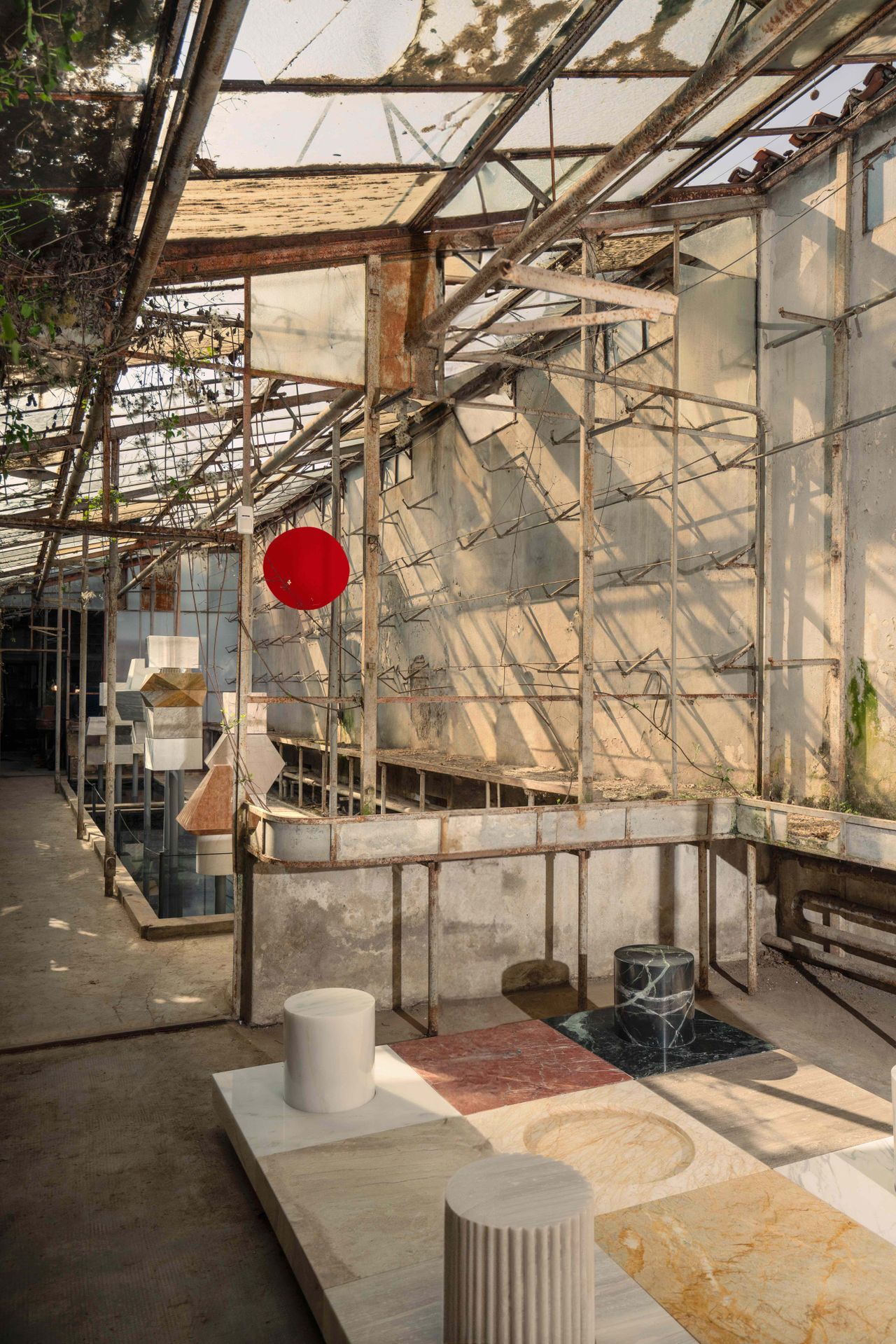 Sculptural Marble objects in abandoned glasshouse