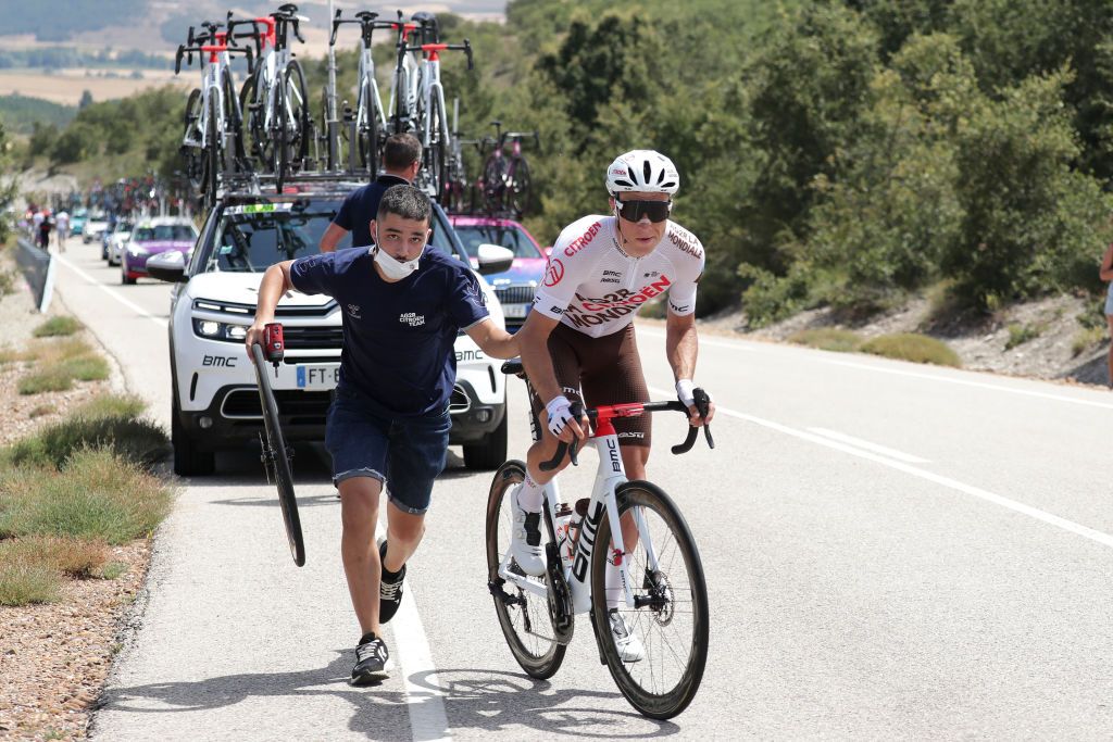 BURGOS SPAIN AUGUST 03 Damien Touz of France and AG2R Citren Team helps by a Team mechanic during the 43rd Vuelta a Burgos 2021 Stage 1 a 161km stage from BurgosCatedral to BurgosAlto del Castillo 980m VueltaBurgos BurgosCycling CapitalMundialdelCiclismo catedral2021 on August 03 2021 in Burgos Spain Photo by Gonzalo Arroyo MorenoGetty Images