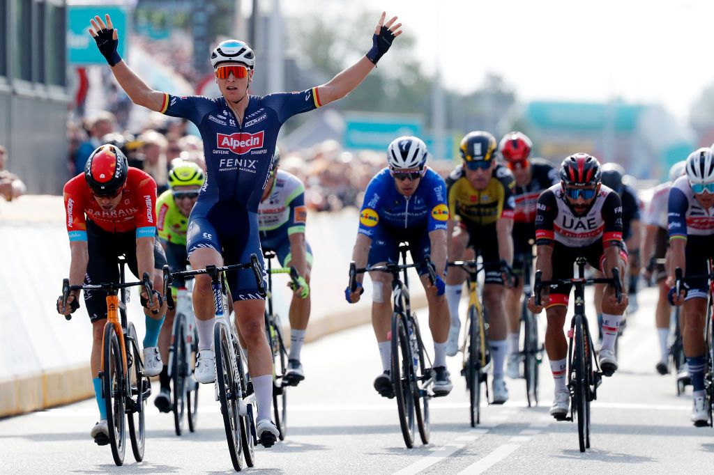 DOKKUM NETHERLANDS AUGUST 30 Tim Merlier of Belgium and Team AlpecinFenix celebrates winning during the 17th Benelux Tour 2021 Stage 1 a 1696km stage from Surhuisterveen to Dokkum BeneluxTour on August 30 2021 in Dokkum Netherlands Photo by Bas CzerwinskiGetty Images