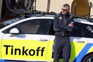 New directeur sportif Sean Yates watches his riders from the road side