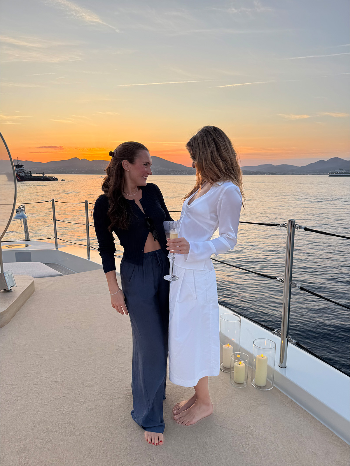 Eliza Huber and Kaelie Kelleher on the Alo yacht.